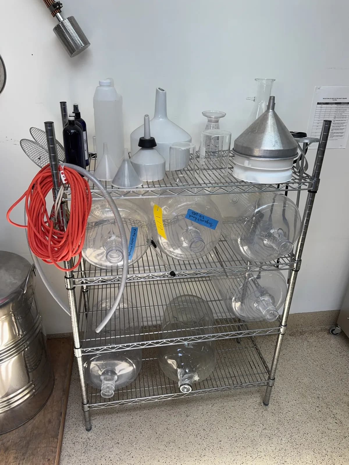 stainless-steel-uline-rack-and-contents-plastic-6-gallon-jugs-glassware-mashers-and-funnels-ms998l3a