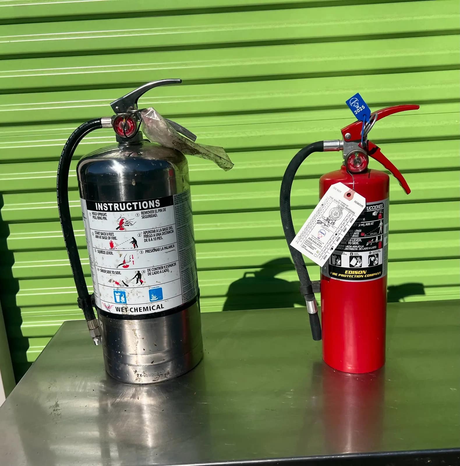 2-fire-extinguishers-wet-chemical-and-dry-chemical-mu1fnj2k