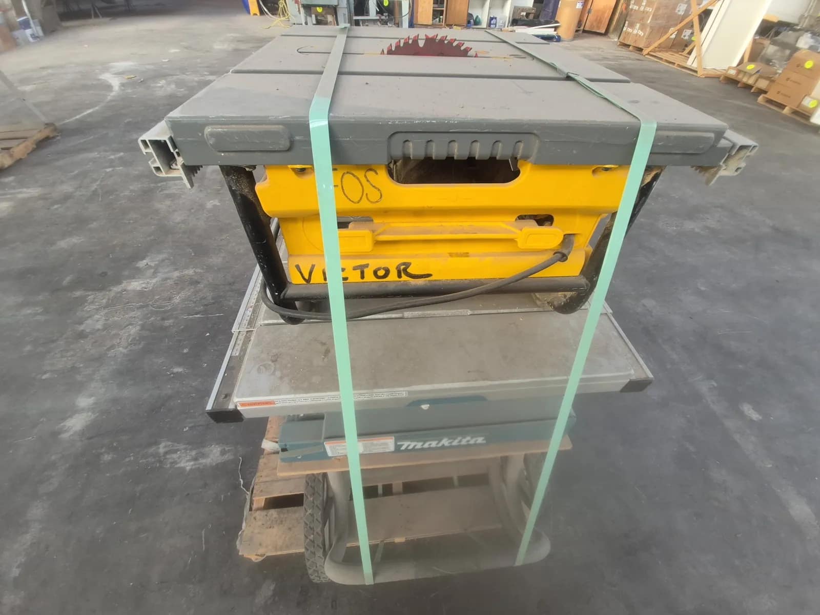contents-of-pallet-1-dewalt-10-inch-corded-table-saw-1-makita-10-inch-portable-table-saw-mva2lwif