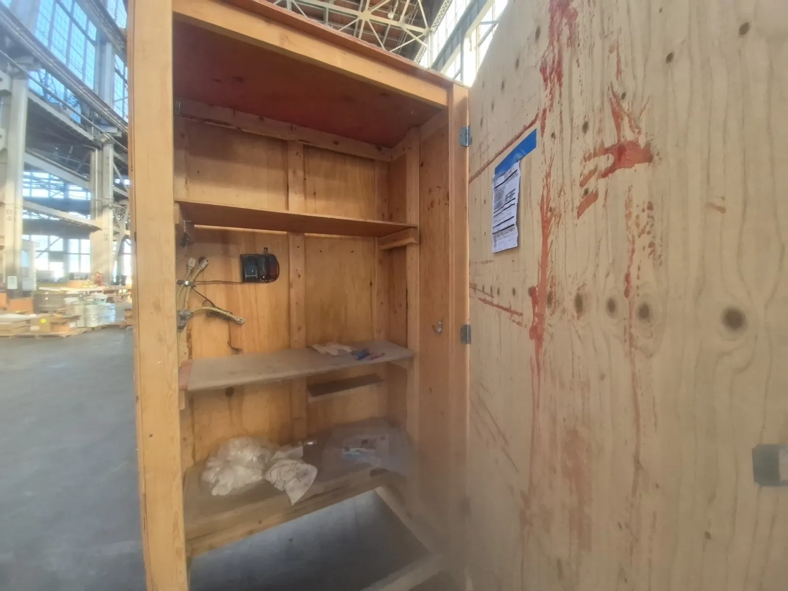 1-wooden-storage-cabinet-with-shelves-and-door-609530