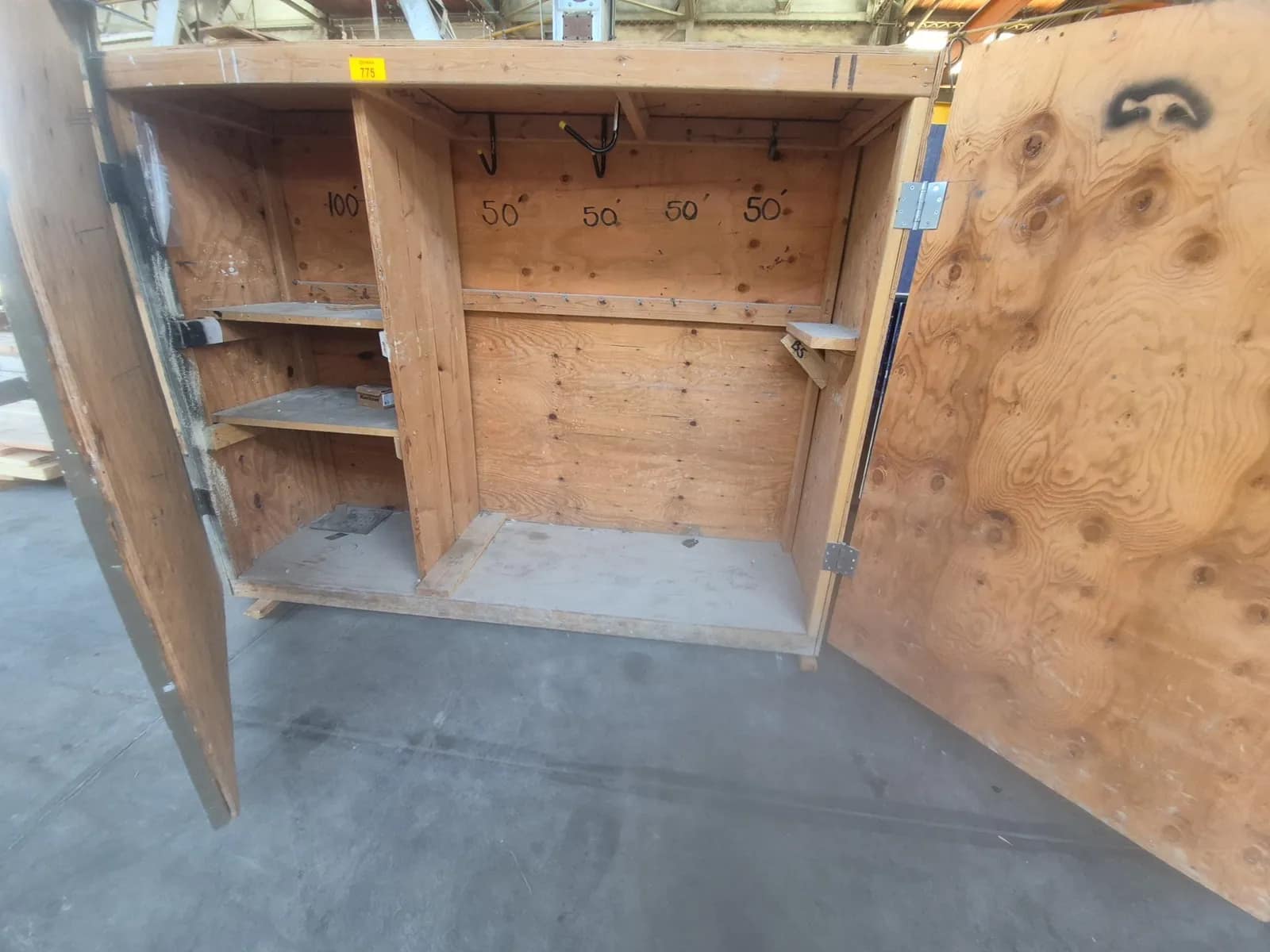 1-wooden-storage-cabinet-with-shelves-and-hooks-6c6e25