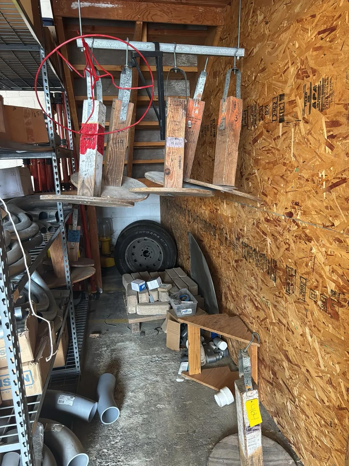 contents-under-staircase-2-tires-rolling-toolbox-job-site-light-extension-cords-and-bricks-0608-1792699679323-mvjz3pej