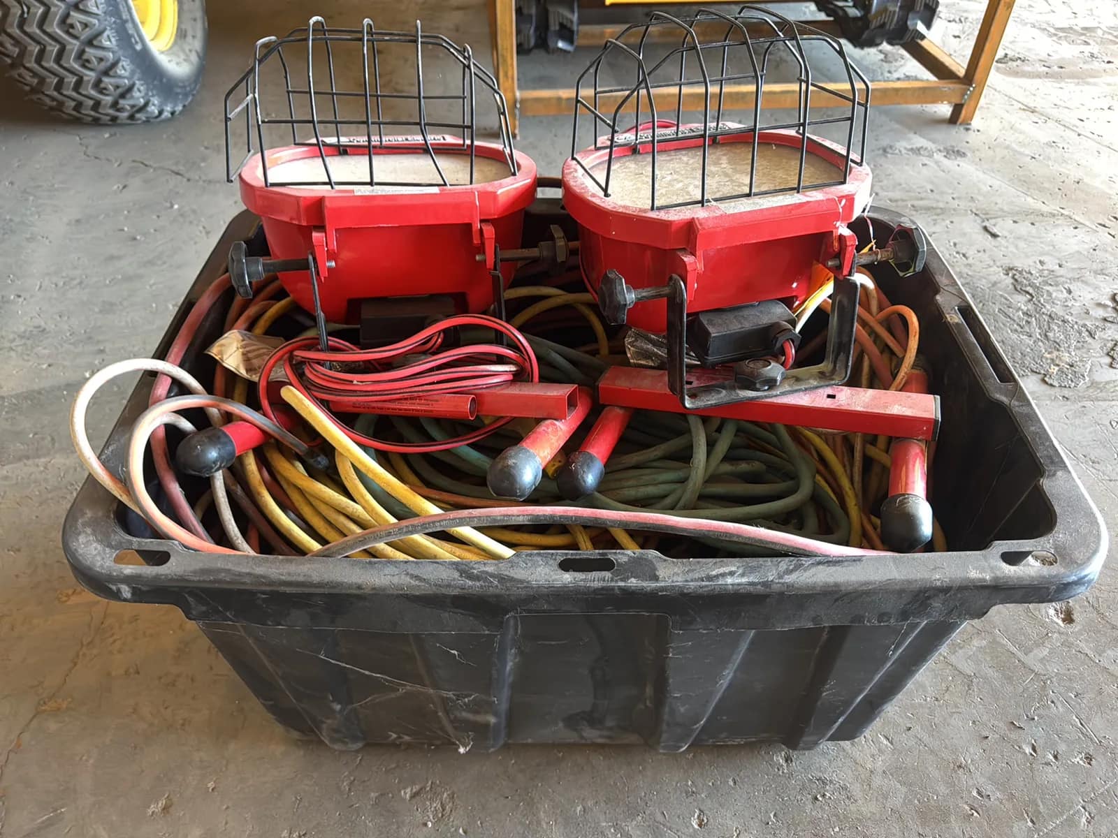 plastic-bin-with-assorted-work-lamps-and-extension-cords-ad06c1