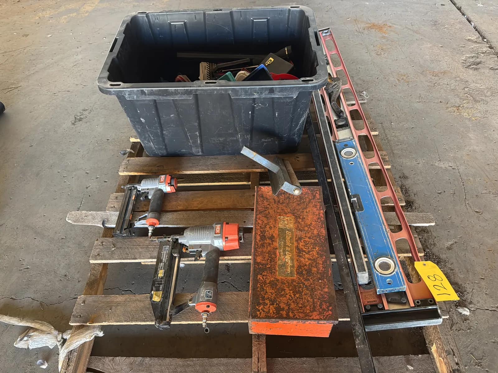 pallet-of-assorted-nail-guns-levels-and-tools-9080ff